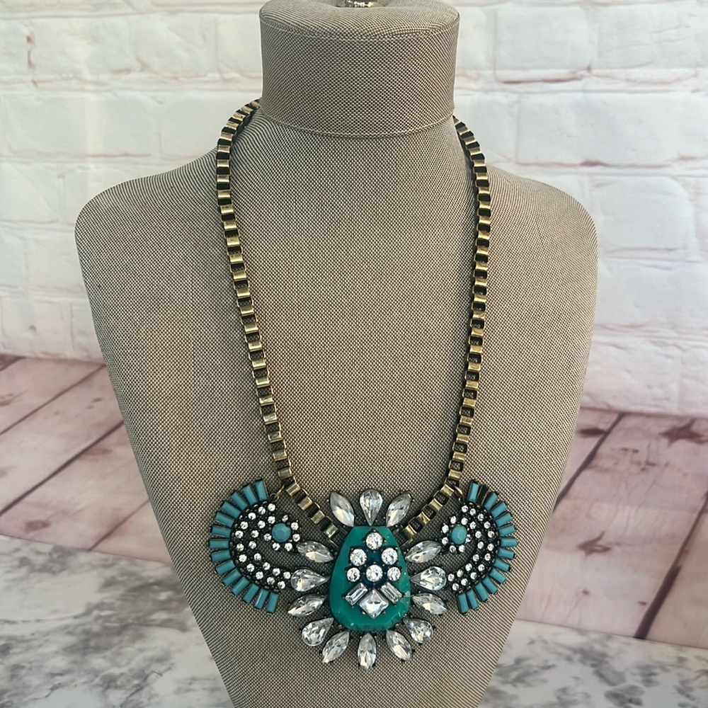 Statement blue embellished necklace blue and brass like material